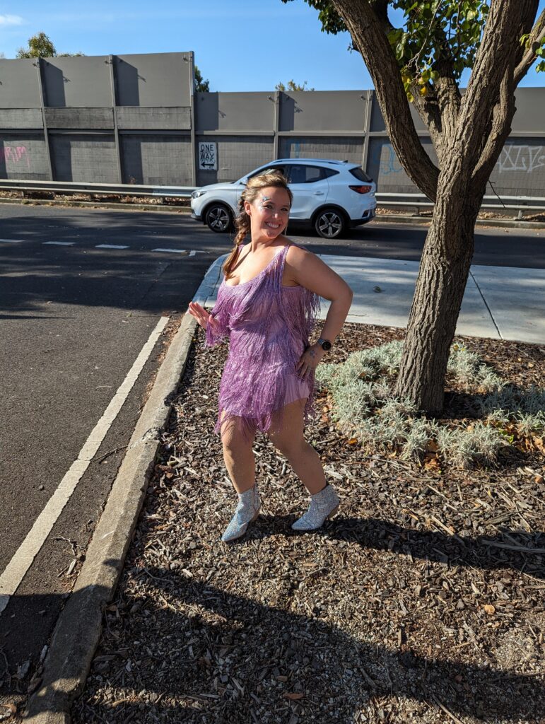Taylor Swift Eras Tour Looks 2024 20 taylor swift midnights era lavender fringe dress with lots of sparkle and glam